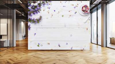 Blank tabletop scene with spring flowers and a cup of tea Wall mural