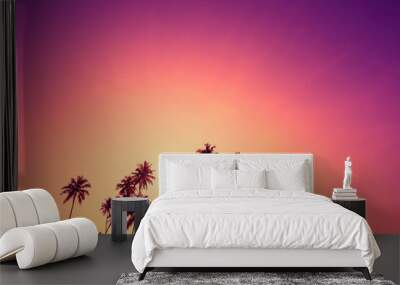 coconut palm trees silhouettes on tropical beach during vivid sunset with colorful sky Wall mural