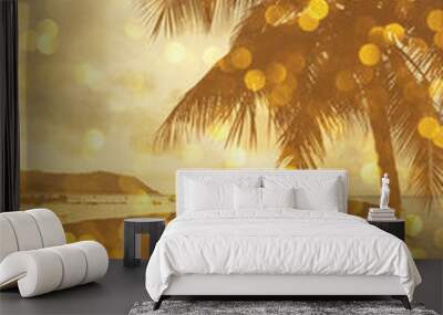 Palm tree over water on tropical beach with golden party glamour bokeh overlay, double exposure effect stylized Wall mural