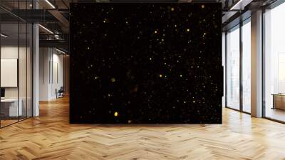 Shiny golden glitter particles falling on black background Wall mural