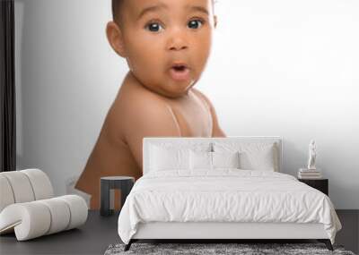 Adorable African-American baby in diaper on white background Wall mural