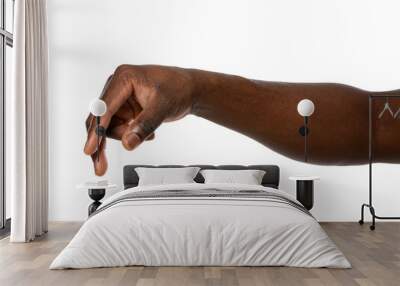 African-American man holding something in hand on white background, closeup Wall mural