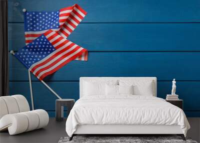 American flags on blue wooden table, flat lay with space for text. Memorial Day Wall mural