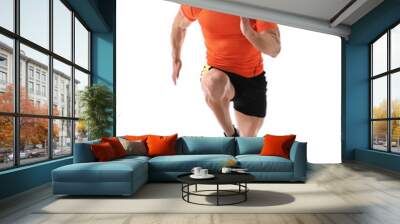 Athletic young man running on white background Wall mural