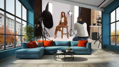 Beautiful African American model posing for professional photographer in studio Wall mural