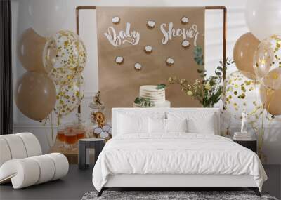 Beautiful cake and other treats on table in room. Baby shower party Wall mural