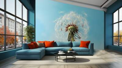 Beautiful dandelion flower on light blue background, closeup Wall mural