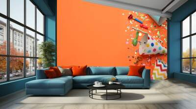 Beautiful flat lay composition with festive items on orange background, space for text. Surprise party concept Wall mural