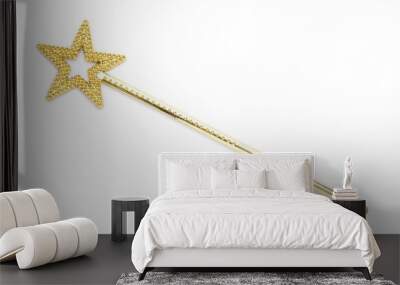 Beautiful golden magic wand isolated on white, top view Wall mural