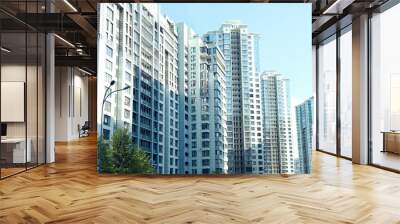 Beautiful view of modern buildings on sunny day Wall mural