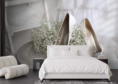 Beautiful wedding shoes, engagement ring and flowers on table indoors, closeup Wall mural