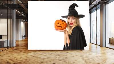 Beautiful woman in witch costume with jack o'lantern on white background, space for text. Halloween party Wall mural