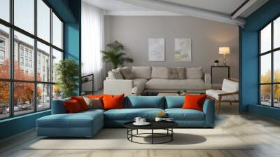 Big comfortable sofa in living room. Interior design Wall mural