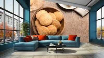 Bowl with Danish butter cookies on wooden background, top view. Space for text Wall mural