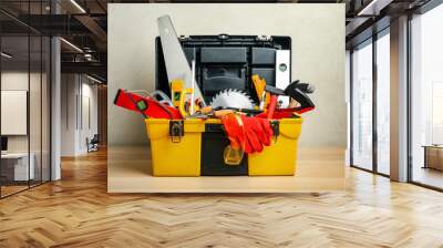 Box with different carpenter's tools on wooden table Wall mural