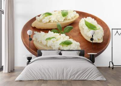 Bread with cottage cheese and basil isolated on white Wall mural