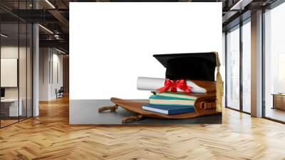 Briefcase with books, diploma and graduation hat on table against white background Wall mural