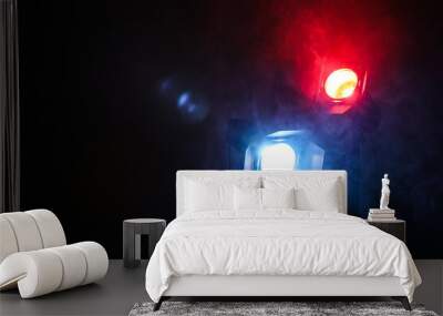 Bright colorful spotlights in darkness, space for text Wall mural