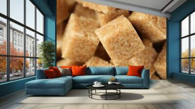 Brown sugar cubes as background, closeup view Wall mural