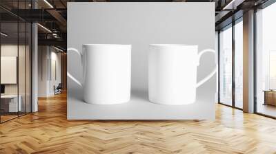 Ceramic cups on light background. Mock up for design Wall mural