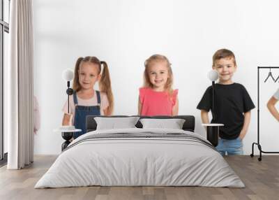 Cheerful children of different ages on white background. Collage design Wall mural