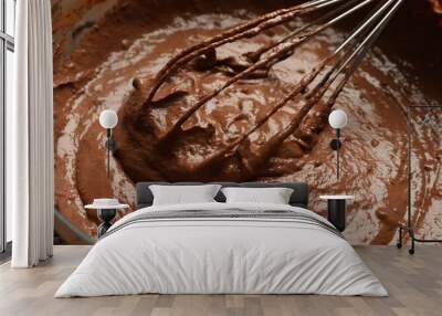 Chocolate dough and whisk in bowl, closeup Wall mural