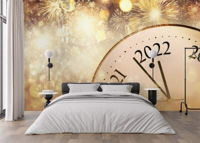 Clock counting last moments to New 2022 Year and beautiful fireworks on background, banner design Wall mural