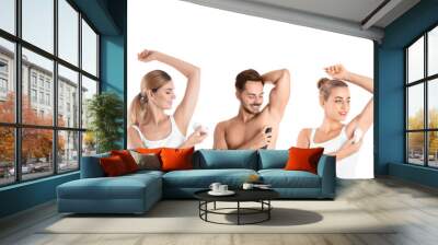 Collage with photos of people applying deodorants to armpits on white background. Banner design Wall mural