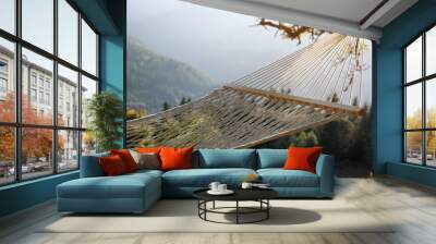 Comfortable net hammock in mountains on sunny day, closeup Wall mural