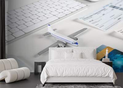 Composition with airplane model on table. Travel agency concept Wall mural