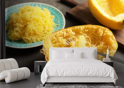 Cooked spaghetti squash and fork on table Wall mural