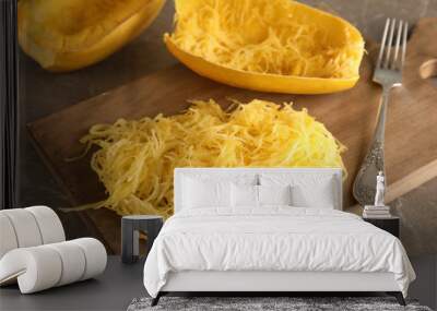 Cooked spaghetti squash and fork on wooden board Wall mural