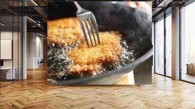 Cooking schnitzels in frying pan, closeup view Wall mural