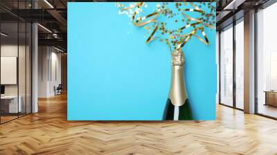 Creative flat lay composition with bottle of champagne and space for text on color background Wall mural