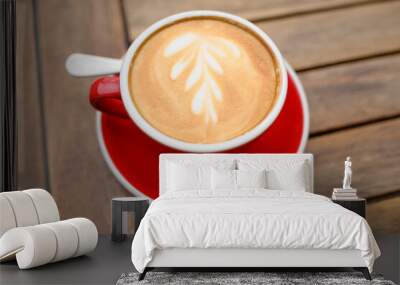 Cup of aromatic coffee on wooden table, above view Wall mural