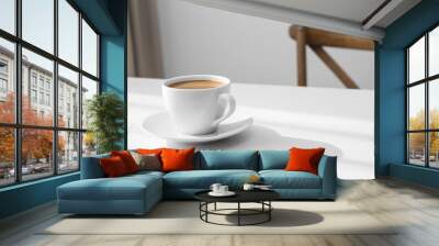 Cup of hot aromatic coffee on white table indoors. Space for text Wall mural