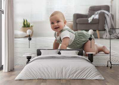 Cute baby crawling on floor at home Wall mural