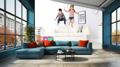 Cute little children playing, indoors Wall mural