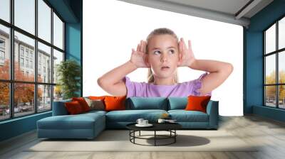 Cute little girl with hearing problem on white background Wall mural