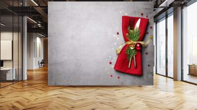 Cutlery set on grey table, top view with space for text. Christmas celebration Wall mural