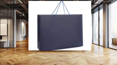 Dark blue paper shopping bag isolated on white Wall mural