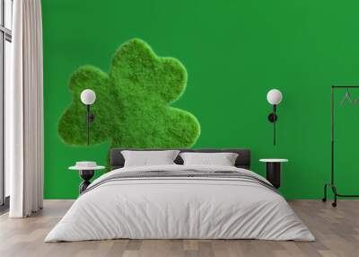 Decorative clover leaf on green background, space for text. Saint Patrick's Day celebration Wall mural