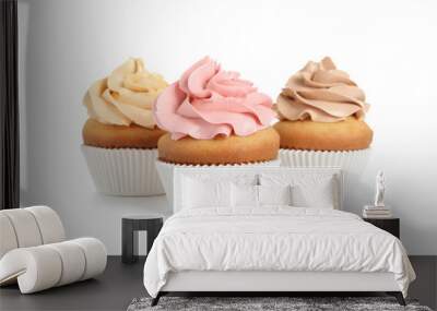 Delicious birthday cupcakes on white background Wall mural