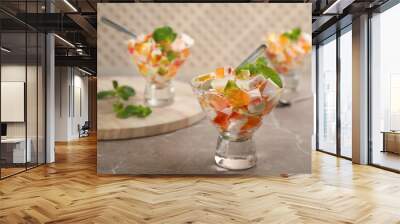 Delicious broken glass jelly dessert on table, space for text Wall mural