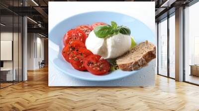 Delicious burrata cheese, tomatoes, basil and bread on white table, closeup Wall mural