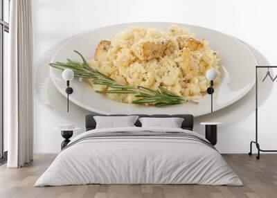 Delicious chicken risotto with rosemary isolated on white Wall mural