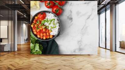 Delicious chickpea curry in bowl on white marble table, flat lay. Space for text Wall mural