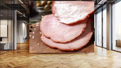 Delicious cooked ham served on wooden board, closeup Wall mural