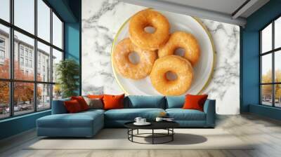 delicious donuts on marble table, top view Wall mural