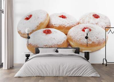 Delicious donuts with jelly and powdered sugar on white background Wall mural